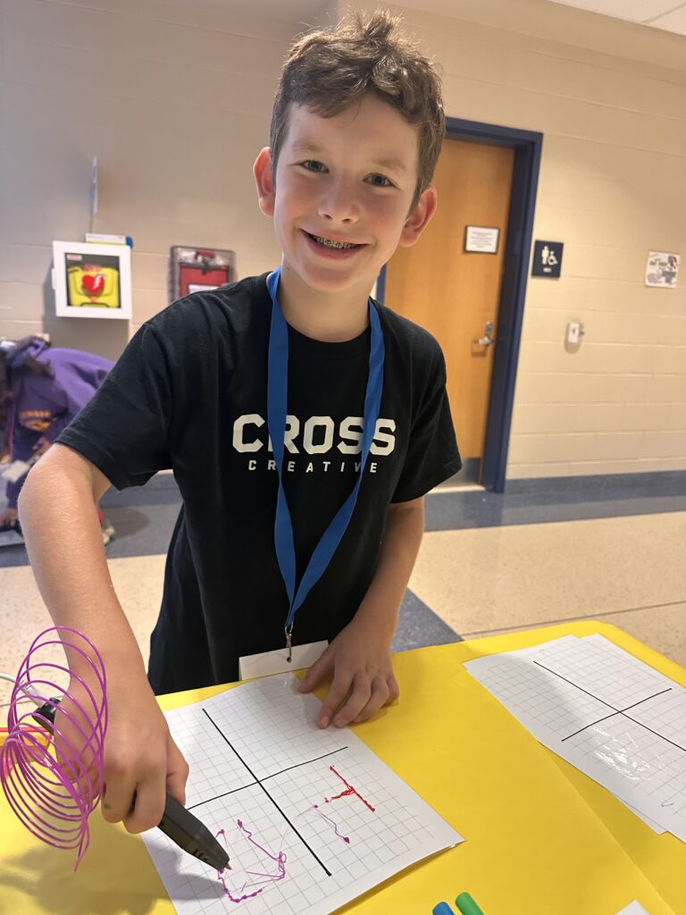 Camp Hill student working on his Cross Creative logo